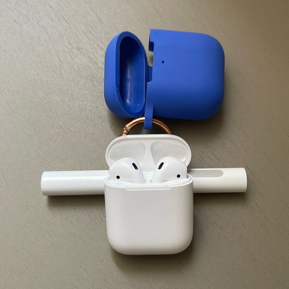 Apple AirPods (2nd generation) with silicone case and cleaning tool